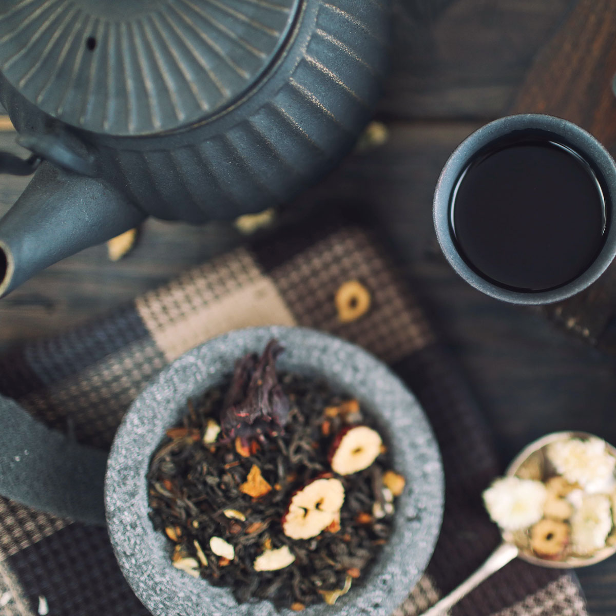tea pot and cup with loose leaf pu-erh tea